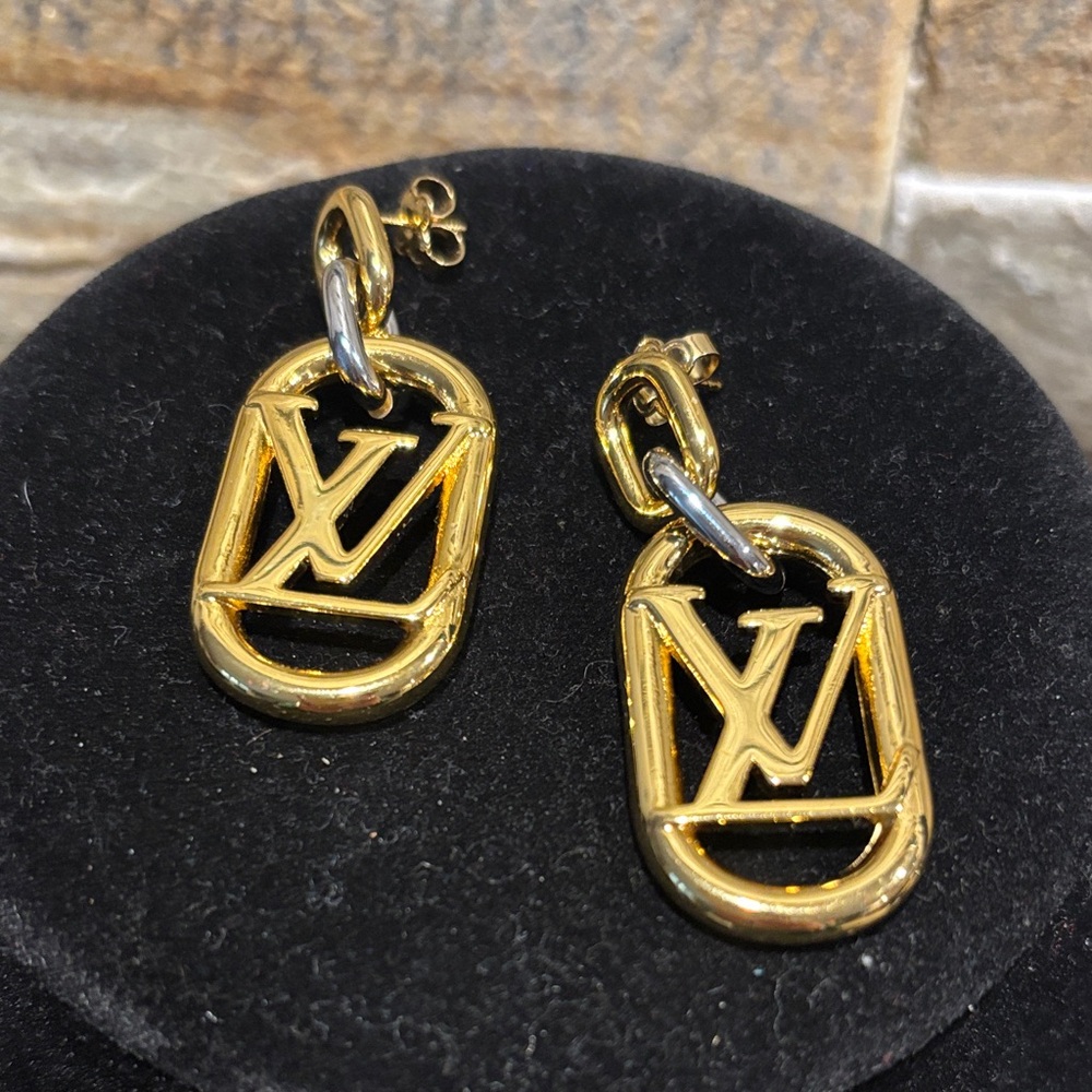 Gold Designer Logo Earrings